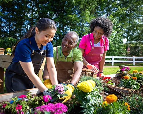 caregiver and resident smiling