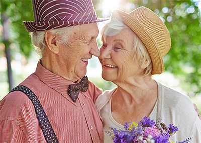 man and woman smiling at each other